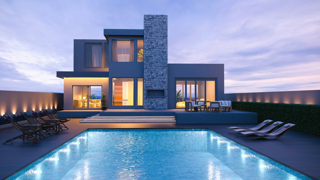 Modern luxury Belleair, FL home exterior at dusk with an illuminated swimming pool